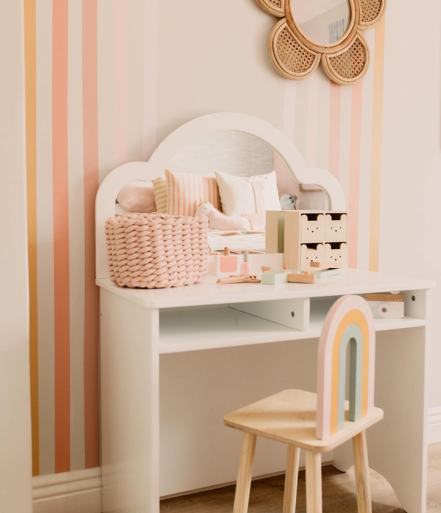 Older child's bedroom with study desk and classic bed frame